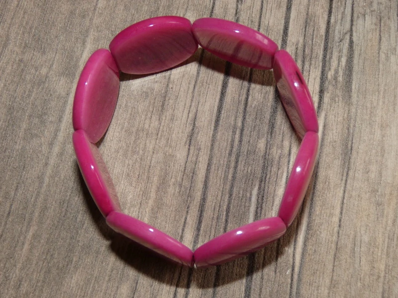 Náramek tagua (růžový, kolečka)
